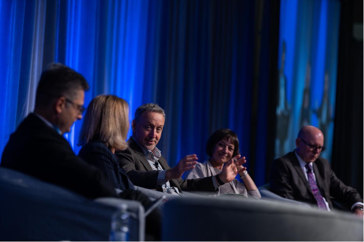 Panelists speaking at the closing plenary.