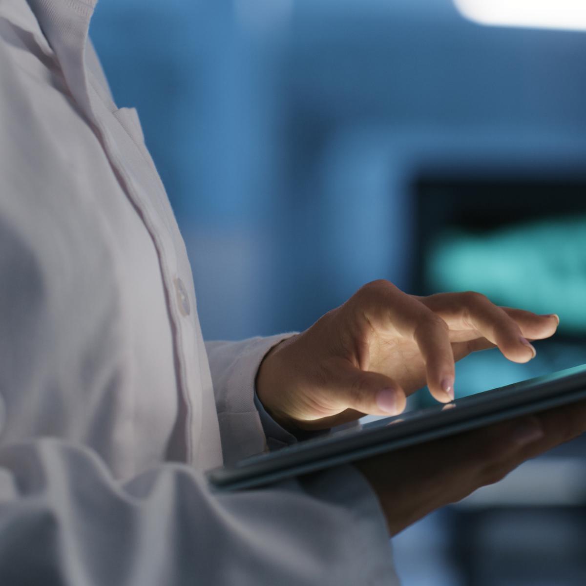 person using ipad